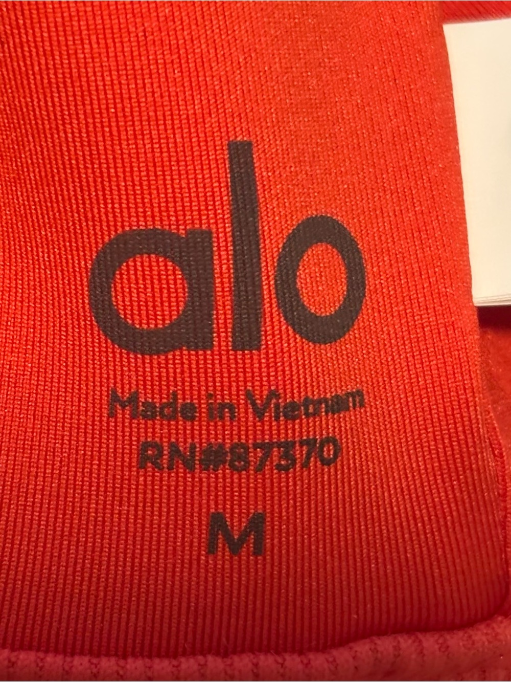 ALO Yoga Coral Ribbed Peekaboo Crop Tank - Picture 6 of 6